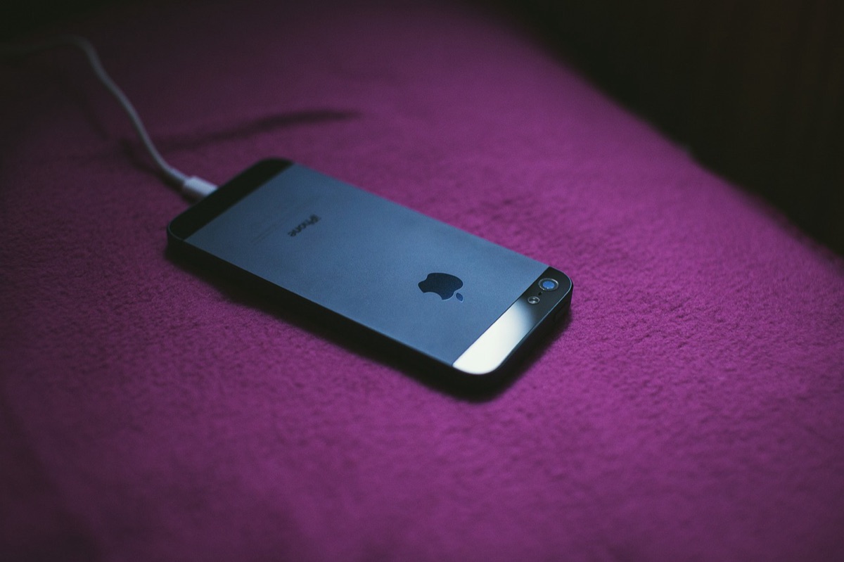 Wireless charging pad on coffee table