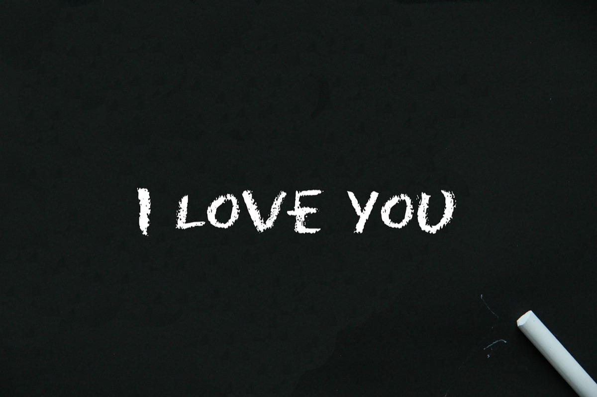 handwritten love note on white paper